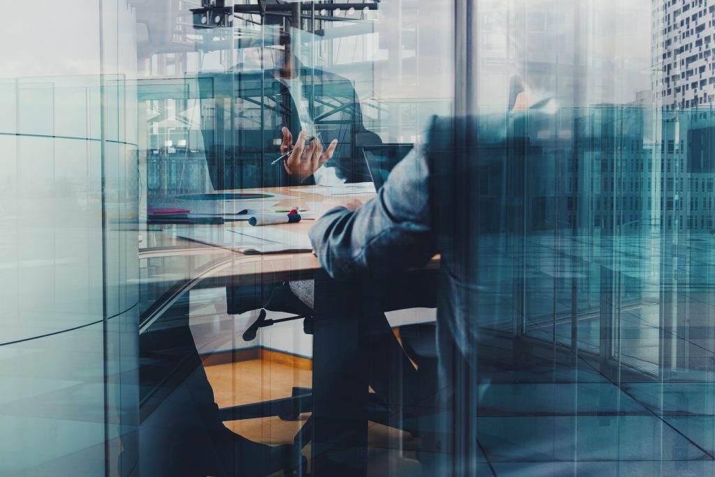 meeting of business people in an office of a skyscraper